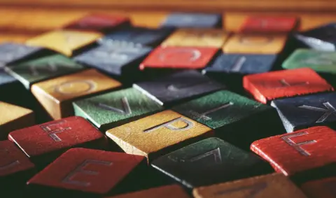 Scattered wooden letter blocks