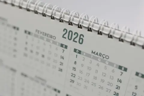 A desk calendar marking the days